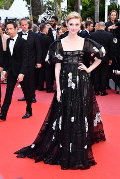 Actress Elizabeth Debicki attended the premiere of 'Solo: A Star Wars Story' at Cannes Film Festival wearing ‘Samanta e Lucia’, a black organza, taffetas and laminated lace dress with puffed sleeves from the Valentino Haute Couture Spring/Summer 2018 Collection designed by Creative Director Pierpaolo Piccioli. #Cannes2018