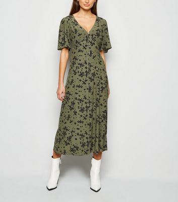 green ditsy midi dress