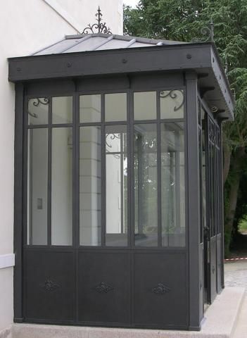 Véranda au style intemporel, Technal Casa de Campo - Playa - porte d entree en anglais Véranda au style intemporel, Technal Casa de Campo - Playa - porte d entree en anglais