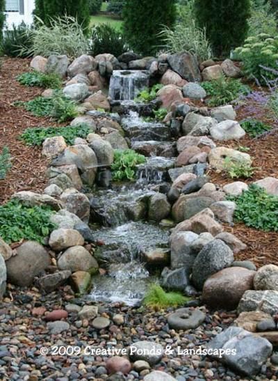 Photo Of Pondless Waterfall Installation Waterfalls Backyard Waterfall Landscaping Pool Landscaping