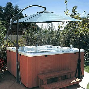 Spa Under The Umbrella Is Your Hot Tub A Little Hot If So You Can Get A Spa Umbrella And Have It Ma Hot Tub Backyard Hot Tub Pergola Hot