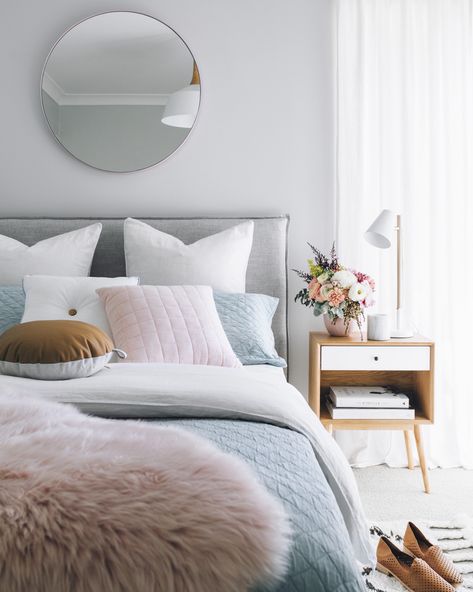 Love the idea of a mirror above the bed to make the room feel bigger