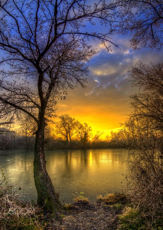 Dawn on frozen lake by Boris Frkovic / 500px