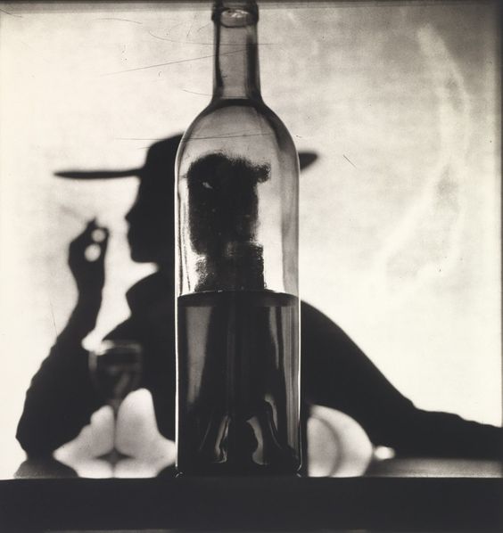 Irving Penn, Girl Behind Bottle (Jean Patchett), New York, 1949