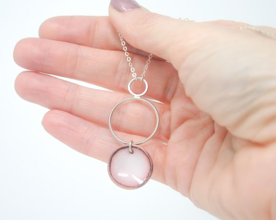 Necklace with enameled penny suspended from sterling silver rings. The chain length is adjustable from 16 to 18"Pendant measures 2"Penny jewelry is a great copper anniversary gift.Many buy my enamel penny jewelry as a "pennies from heaven" gift, to remember a loved one.You can order these with a custom date (between 1940 and 1982) buy adding this custom date upgrade here