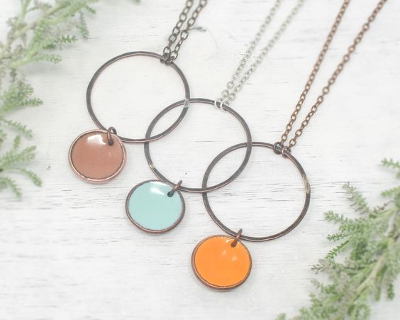 Necklace with enameled penny suspended on large blackened copper ring, on chain.The chain length is adjustable from 16 to 18"Pendant measures 2"Penny jewelry is a great copper anniversary gift.Many buy my enamel penny jewelry as a "pennies from heaven" gift, to remember a loved one.You can order these with a custom date (between 1940 and 1982) buy adding this custom date upgrade here
