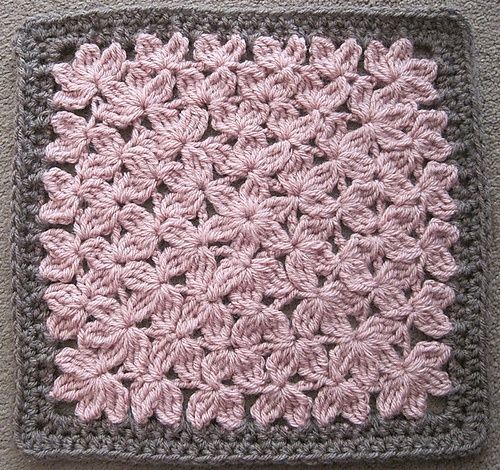 Crocheted in the round like a granny square, it reminds me of a field for flowers