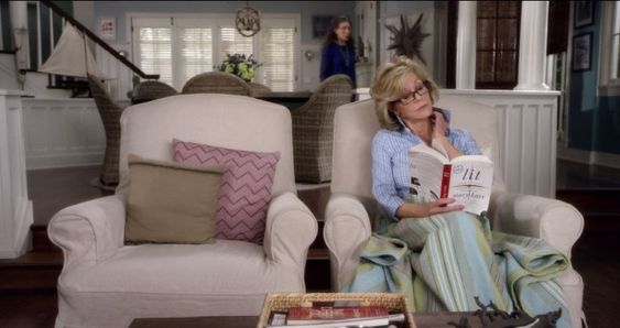 Grace and Frankie beach house living room with slipcovered armchairs. #graceandfrankie
