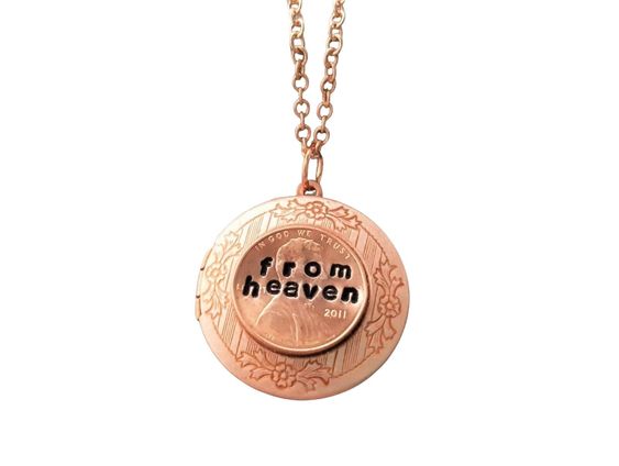 "A pretty detailed rose gold plated brass locket has been set with a hand-stamped penny that says pennies from heaven. The locket suspends from a lead and nickel free matching link chain. Your necklace will come in a pouch for gifting and storage. Measures: 24\\" long Locket: 1 1/4\\" in diameter Please remember this is a hand stamped item and no two will ever be the exact same. The letters may not be lined up exactly but this adds the character and charm of being handmade. A perfect memorial lock