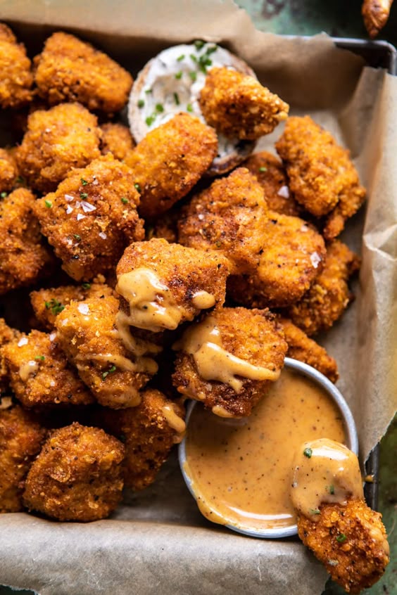 Oven Fried Cajun Popcorn Chicken with Creamy Honey Mustard | halfbakedharvest.com #chickenfingers #easyrecipes