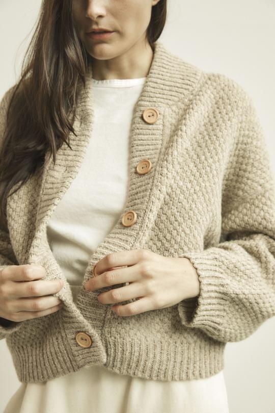 Cropped wide cardigan with wood buttons and a high rounded Cropped wide cardigan with wood buttons and a high rounded
