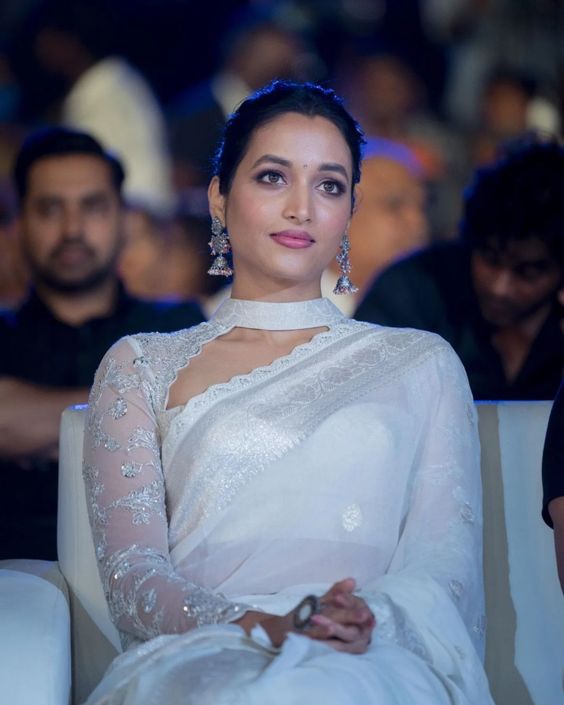 Srinidhi Shetty looks graceful in an ivory silk saree at "Cobra" audio launch!