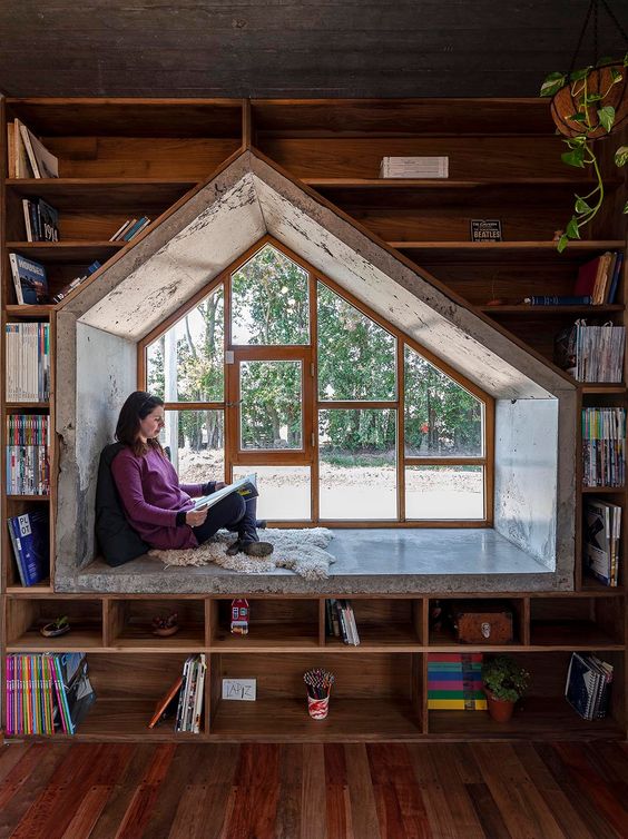 A Deep Window Seat Creates A Reading Space For This Architect’s Office