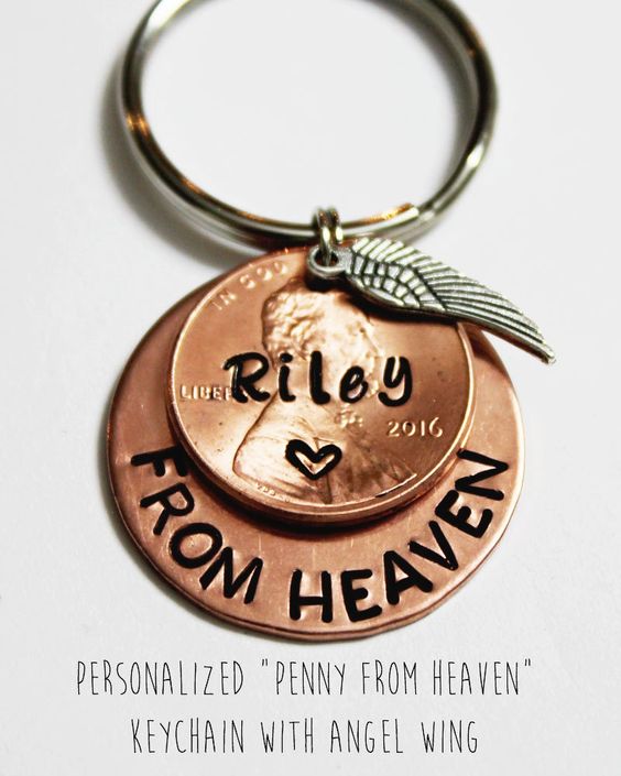 "This would be the perfect gift to give anyone who has lost someone close to them. The keychain comes with a penny that has any one name hand stamped on it, along with a heart stamped below the name, an angel wing charm, and a copper colored charm that has \\"FROM HEAVEN\\" stamped on it. In the box we include a piece of paper with a \\"penny from heaven\\" poem typed on it. THE POEM READS: \\"I found a penny today Just laying on the ground, But it\'s not just a penny, the little coin I found. Found p