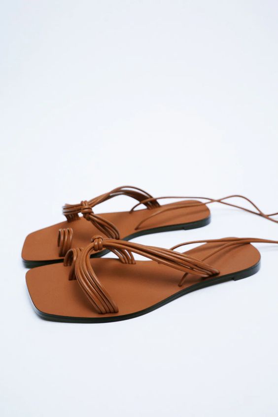 FLAT SANDALS WITH TUBULAR STRAPS