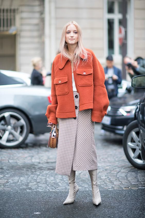 paris fashion week street style spring 2018 charlotte groeneveld orange jacket checked midi skirt white t shirt chloe bag cream sock boots getty images