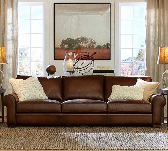 Cách bố trí phòng khách thông minh với sofa da thật tphcm