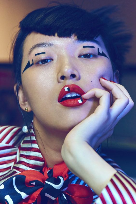 Tian Yi captured by Jem Mitchell for Vogue China. MUA Polly Osmond makes geometry appealing to all - who knew that was possible?