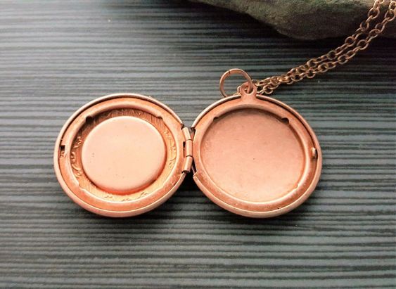 "A pretty detailed rose gold plated brass locket has been set with a hand-stamped penny that says pennies from heaven. The locket suspends from a lead and nickel free matching link chain. Your necklace will come in a pouch for gifting and storage. Measures: 24\\" long Locket: 1 1/4\\" in diameter Please remember this is a hand stamped item and no two will ever be the exact same. The letters may not be lined up exactly but this adds the character and charm of being handmade. A perfect memorial