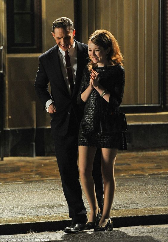 Tom Hardy cosies up to Emily Browning as she rocks a sixties shift