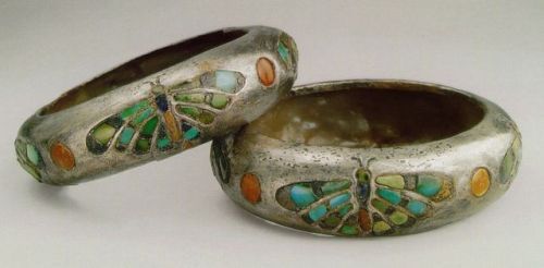 Silver Bracelets of Queen Hetepheres I Some of the earliest silver objects unearthed in Egypt are this rare pair of silver bracelets belong to Queen Hetepheres I inlaid with semi-precious stones in the form of a dragonfly (silver turquoise lapis lazuli and carnelian). Old Kingdom 4th Dynasty ca. 2575-2550 BC. From the Tomb of Hetepheres I G 7000X near the Great Pyramid of Giza Now in the Egyptian Museum Cairo.