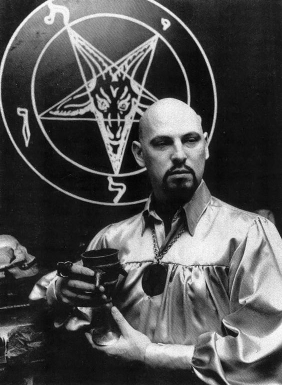 Portrait of Magus Anton Szandor LaVey in front of his altar