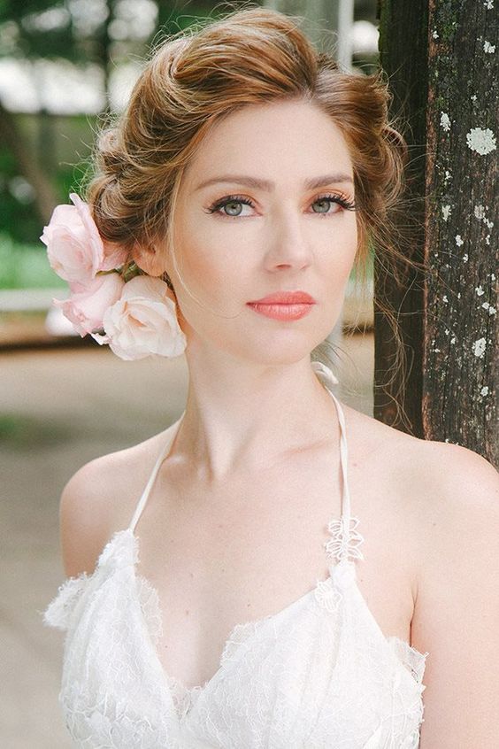 stunning bridal peach makeup, lovely hair with flowers...:)