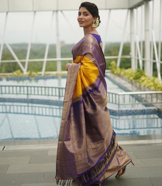 Aishwarya Lekshm shines in a yellow silk saree at "Kumari" trailer launch!