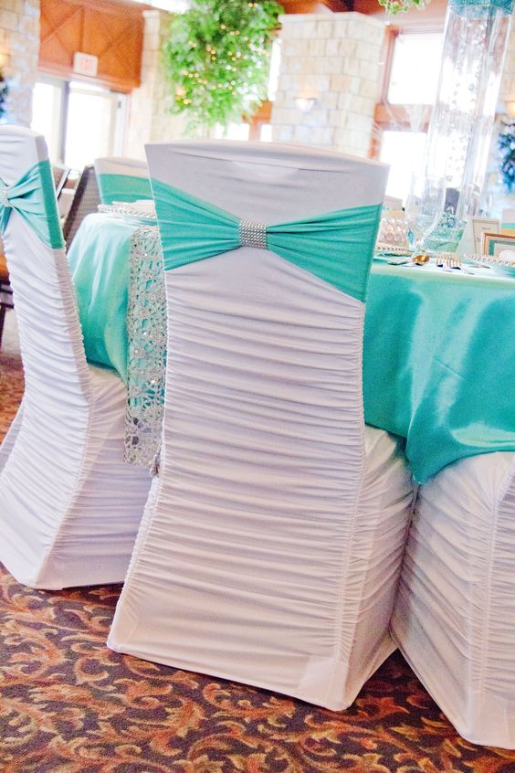 White Ruched Chair Cover, Tiffany Blue Spandex Sash, and Silver Bling Cuff