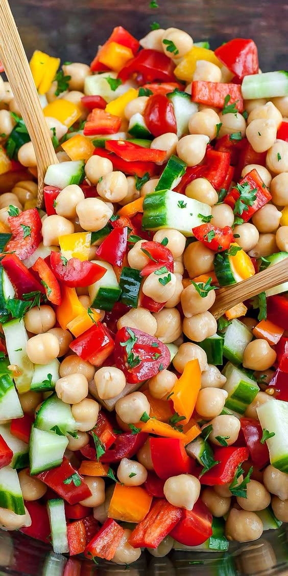 Loaded with fresh seasonal veggies and tossed in a tasty and light homemade dressing, this vegetarian Greek Chickpea Salad makes healthy eating a breeze! We love it as a healthy side dish and it's a… Loaded with fresh seasonal veggies and tossed in a tasty and light homemade dressing, this vegetarian Greek Chickpea Salad makes healthy eating a breeze! We love it as a healthy side dish and it's a…