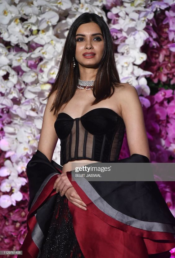 Indian Bollywood actress Diana Penty poses for photographs as she...