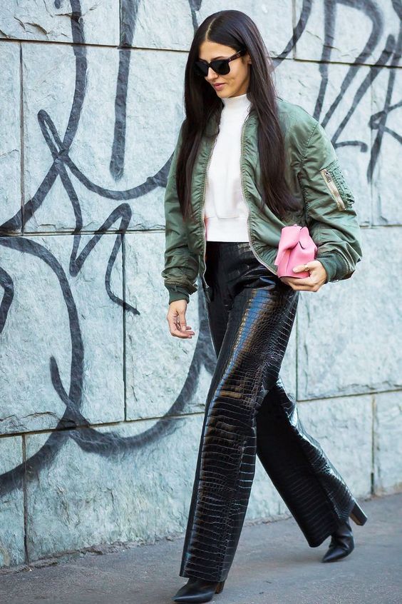 See the bomber jacket outfit ideas we're loving for 2018, thanks to our favorite street style stars. #bomberjackets #bomberjacketoutfit #outerwear #jacketsforwomen