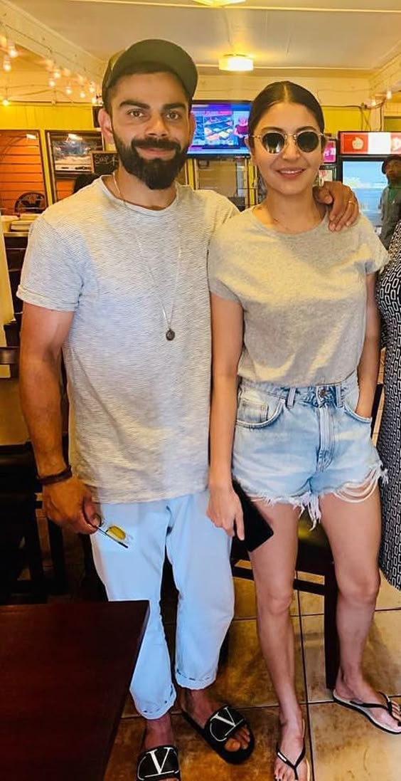 Checkout the Anushka Sharma And Virat Kohli Twins Look in Denim Shorts and T-shirts only at our blog.