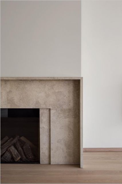 Fire place in natural stone by Hullebusch.