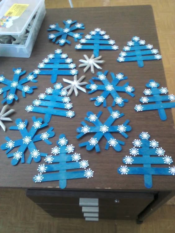I like this different color/style of Christmas trees and snowflakes made with craf