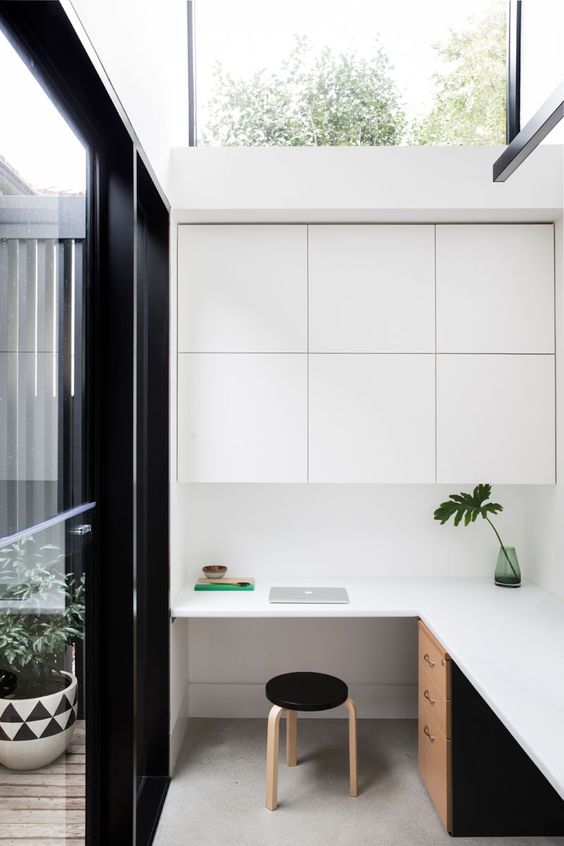 A Contemporary Shed-Like Addition Was Added To This 1930’s House