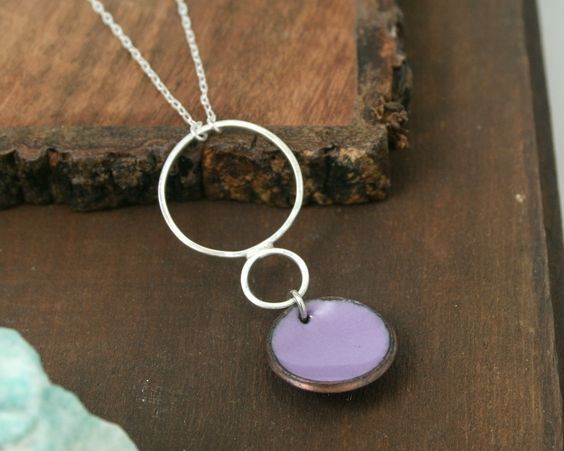 Necklace with enameled penny suspended from sterling silver rings. The chain length is adjustable from 16 to 18"Pendant measures 2"Penny jewelry is a great copper anniversary gift.Many buy my enamel penny jewelry as a "pennies from heaven" gift, to remember a loved one.You can order these with a custom date (between 1940 and 1982) buy adding this custom date upgrade here