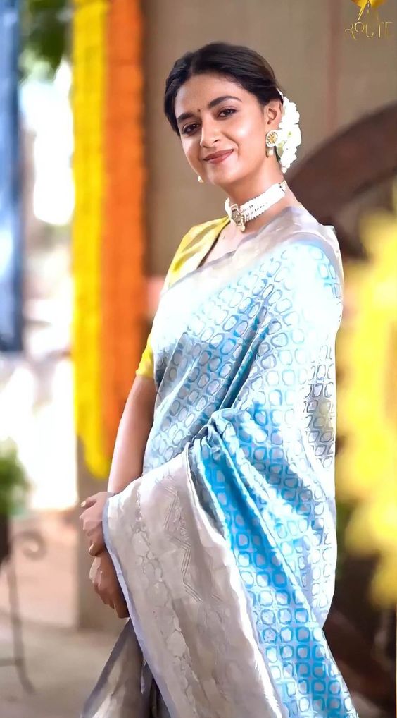 Keerthy Suresh goes traditional in an aqua pattu saree for a wedding!