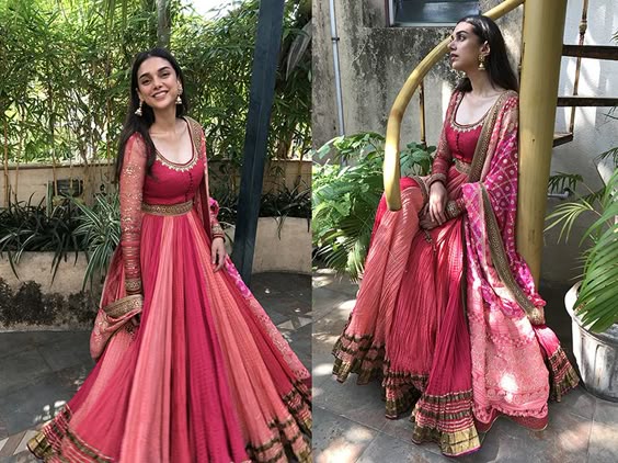 Aditi Rao Hydari looked resplendent in a Gaurang Shah ensemble. She kept her look simple and went only for golden drop earrings.
