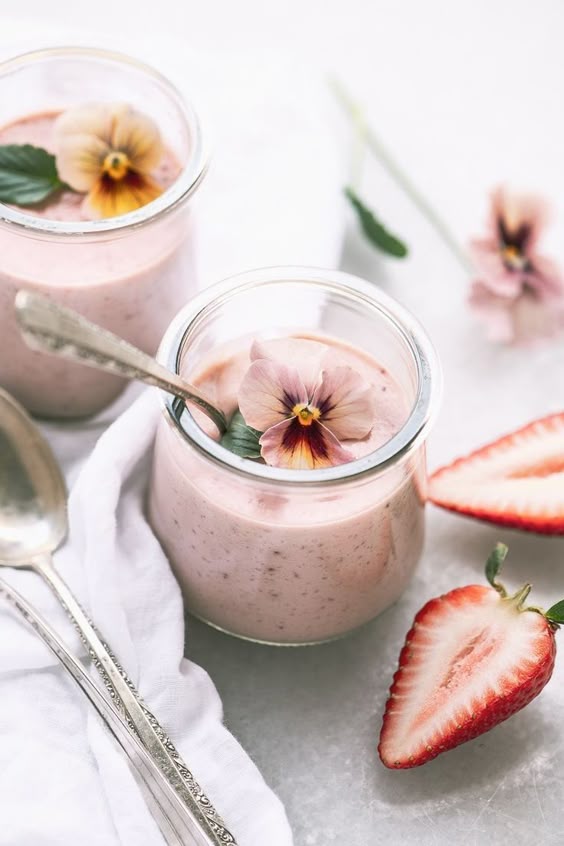 Strawberries and Cream Pots garnished with edible flowers ~ a dreamy strawberry pot de créme made quick and easy on the stove top. #dessert #recipe #easy #potdecreme #custard #pudding #nobake #blender #pannacotta #mothersday #easter #spring #berries #mousse