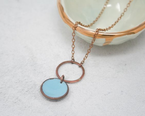Necklace with enameled penny suspended on copper ring, on chain. The chain length is adjustable from 16 to 18"Pendant measures1.5"Penny jewelry is a great teacher gift.Many buy my enamel penny jewelry as a "pennies from heaven" gift, to remember a loved one.You can order these with a custom date (between 1940 and 1982) buy adding this custom date upgrade here