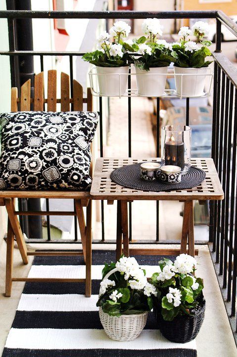 We love how this small balcony has been utilized for personal space and the elegant monochrome trend gives the right outlook!