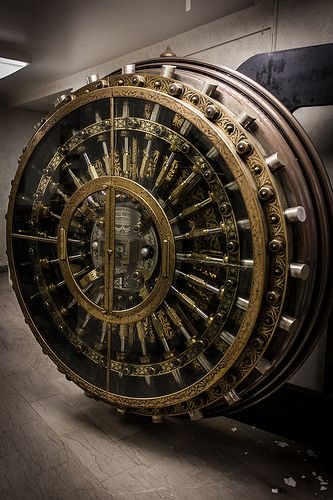This bank vault door looks almost as intricate as a Swiss timepiece