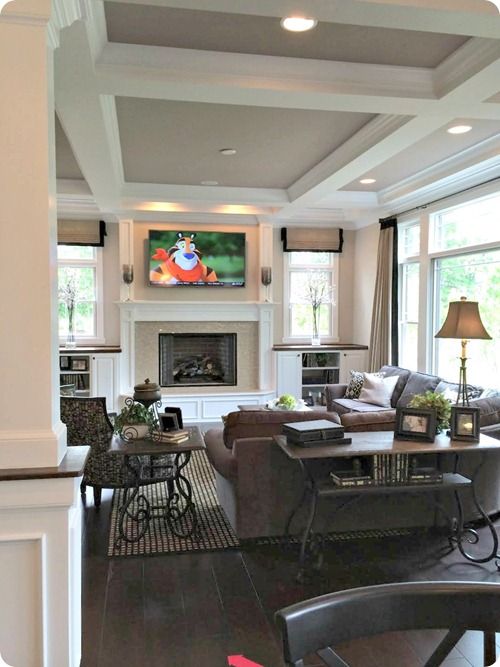 Living Room With Fireplace And Windows partially open shelves flanking the fireplace, woven blinds going Living Room With Fireplace And Windows partially open shelves flanking the fireplace, woven blinds going