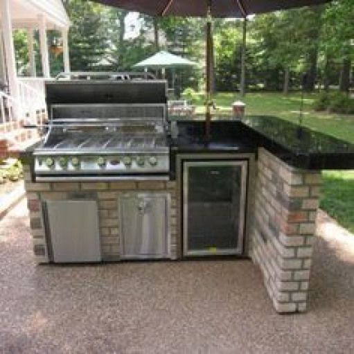 This L Shaped Outdoor Kitchen Features A Bar Counter Sitting Area Besides The Grill Th Decor Design Appliances - Outdoor Grill Kitchen Cabinets This L Shaped Outdoor Kitchen Features A Bar Counter Sitting Area Besides The Grill Th Decor Design Appliances - Outdoor Grill Kitchen Cabinets