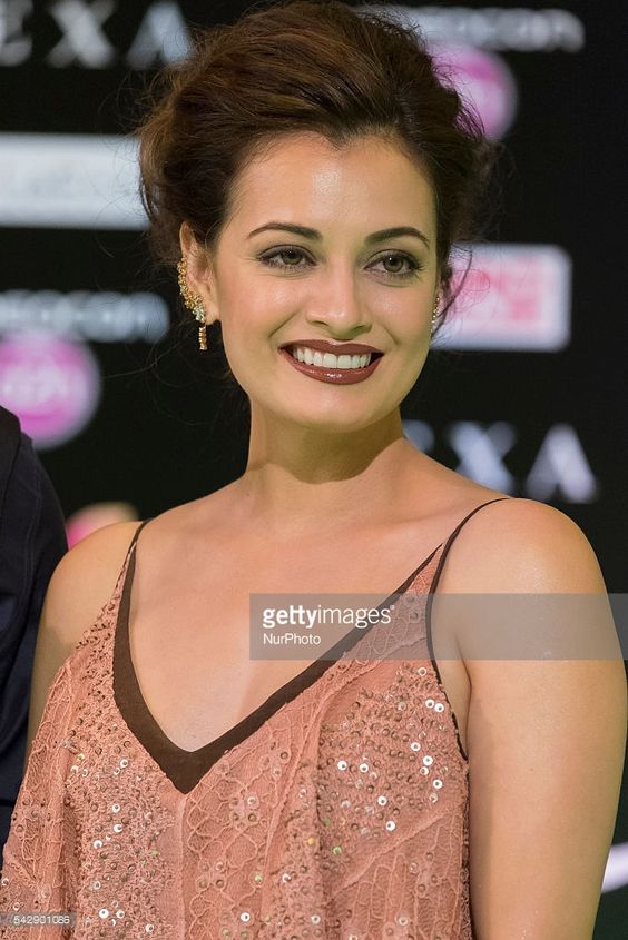 Indian Bollywood actress Dia Mirza poses on the green carpet as she arrives to the 17th edition of IIFA Awards (International Indian Film Academy Awards) in Madrid on June 24, 2016.