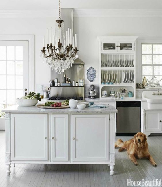 White kitchen with French Country decor. #kitchendesign #whitekitchen #kitchendecor #frenchcountry