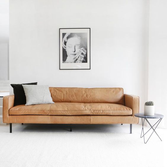 Phong thủy phòng khách tuổi Hợi với sofa da thật tphcm để mang lại may mắn, tài lộc