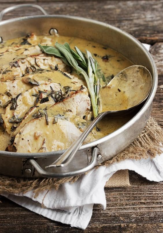 This Pork Loin with Wine and Herb Gravy is absolutely the best pork loin recipe I\'ve ever made! Tender pork loin, cooked with wine, garlic and herbs, then sliced thin with a beautiful gravy.