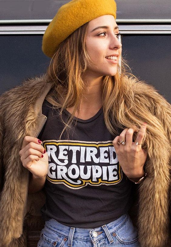 For our fellow (ex) bandaids- our new Retired Groupie graphic tee. This vintage inspired tee has 70's style design on front. Blank back. These tees are fitted. We suggest sizing up if you are in between sizes or prefer a looser fit. - 100% cotton - "vintage" black - Model is wearing a size small - Cut, sewn, dyed and printed in Los Angeles. Sweatshop free Measurements- taken flat (chest width) Small- 16" (32" doubled) Medium- 17" (34" doubled) Large- 18" (36" doubled) XL- 19.5" (39" doubled) XXL- 20.5 (41" doubled)
